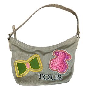 Tous Nylon Sequin Teddy Bear Purse Green Bow
Shoulder Bag with Crossbody Strap